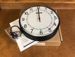 Valcom V-AW11012 12" Round Wireless Clock Black Surface Mount. Fixed Price $140.00.